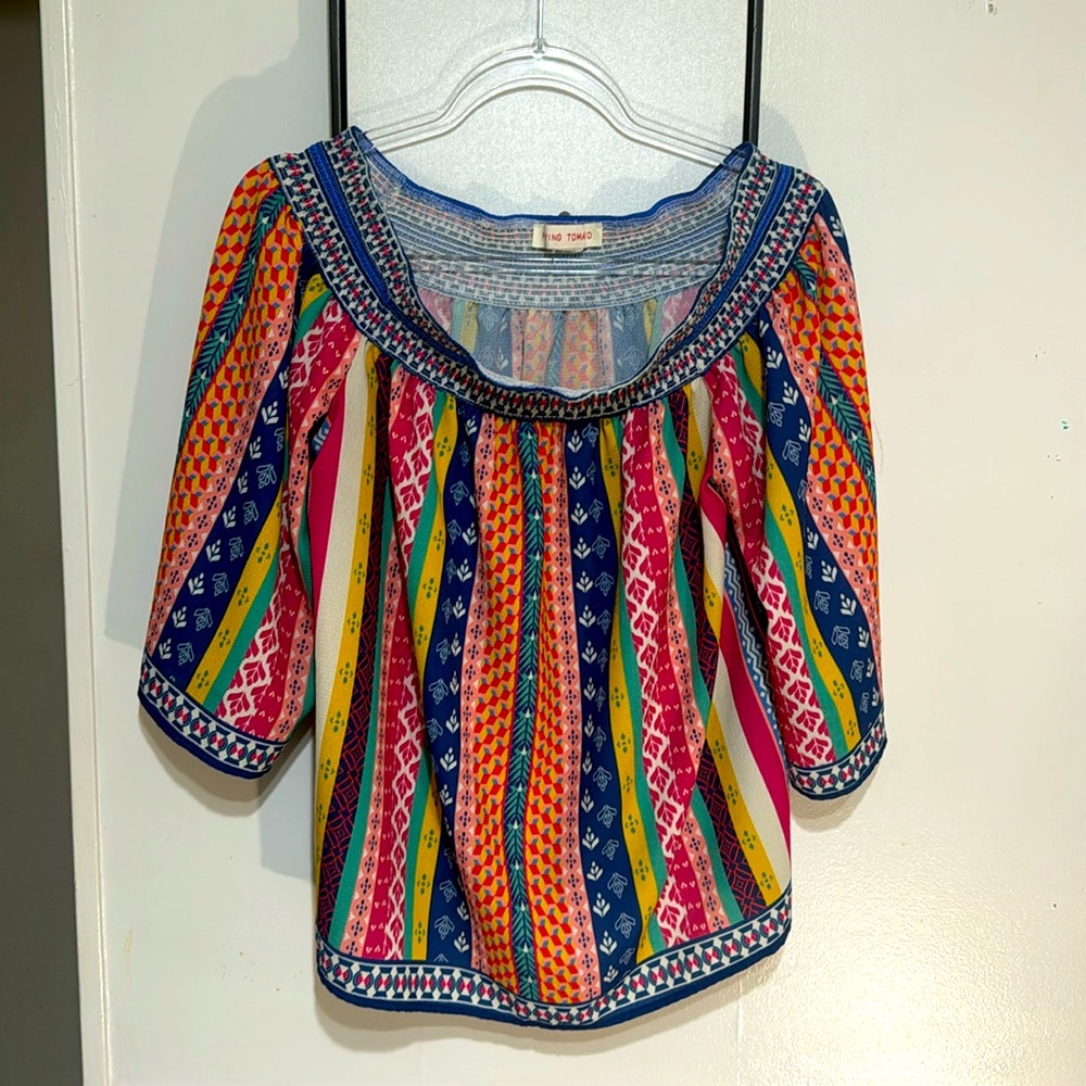 Slightly worn great condition “flying tomato “ top